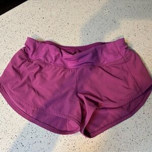 Size 2 Lululemon magenta low rise speed shorts 2.5